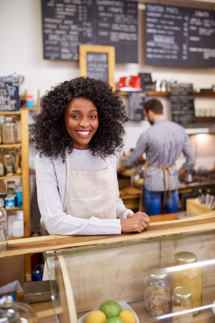 black woman and white man operating a small business
